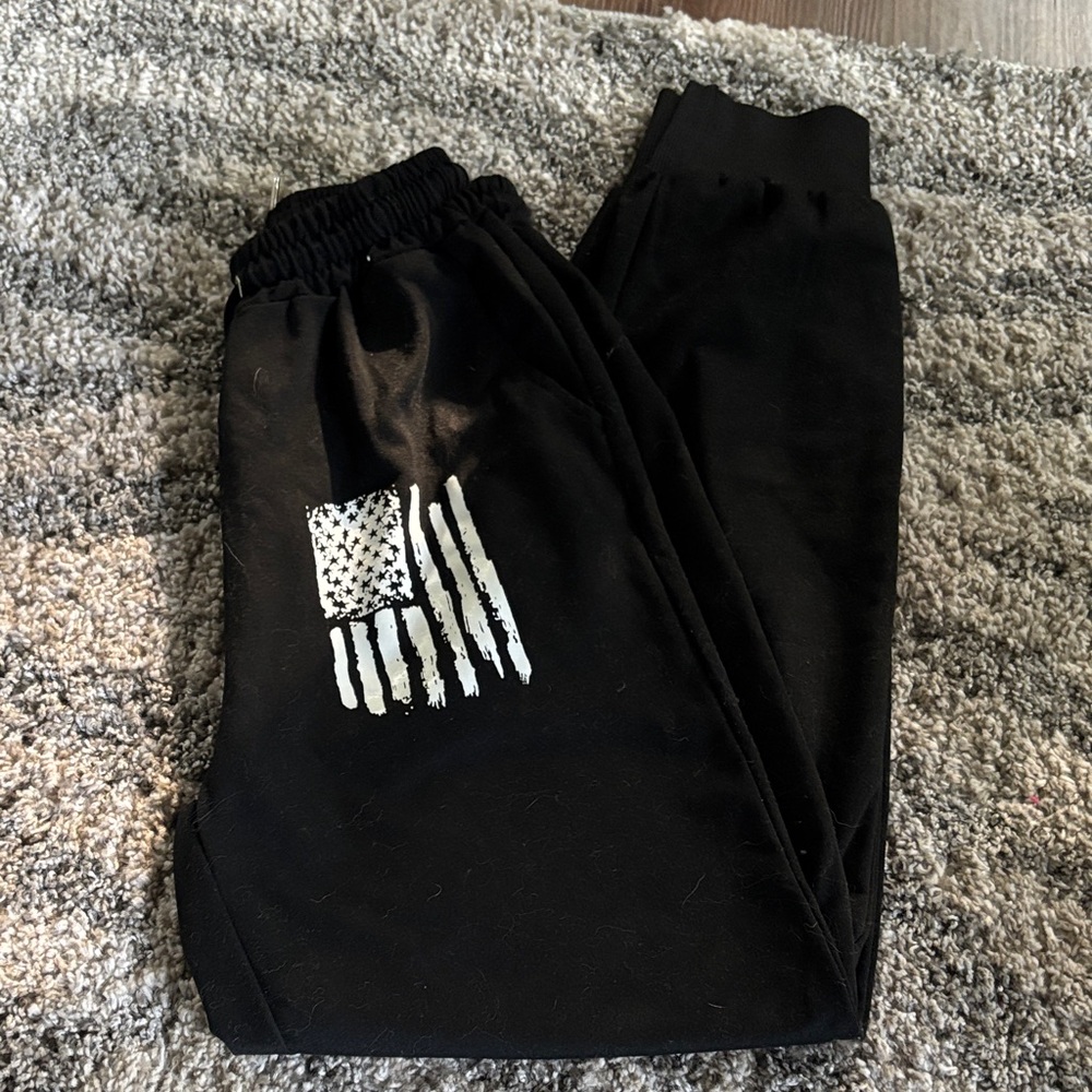 Stylish Black Jogger Pants with Flag Design